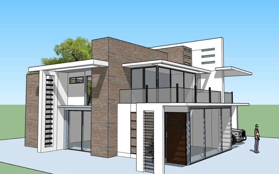 Modern two-story house with white and brown brick facade, large glass walls, balcony, and a person by the driveway.
