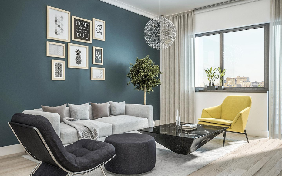 Contemporary living room with a blue accent wall, gallery wall, gray sectional, black coffee table, and a yellow armchair by a large window with sheer curtains.
