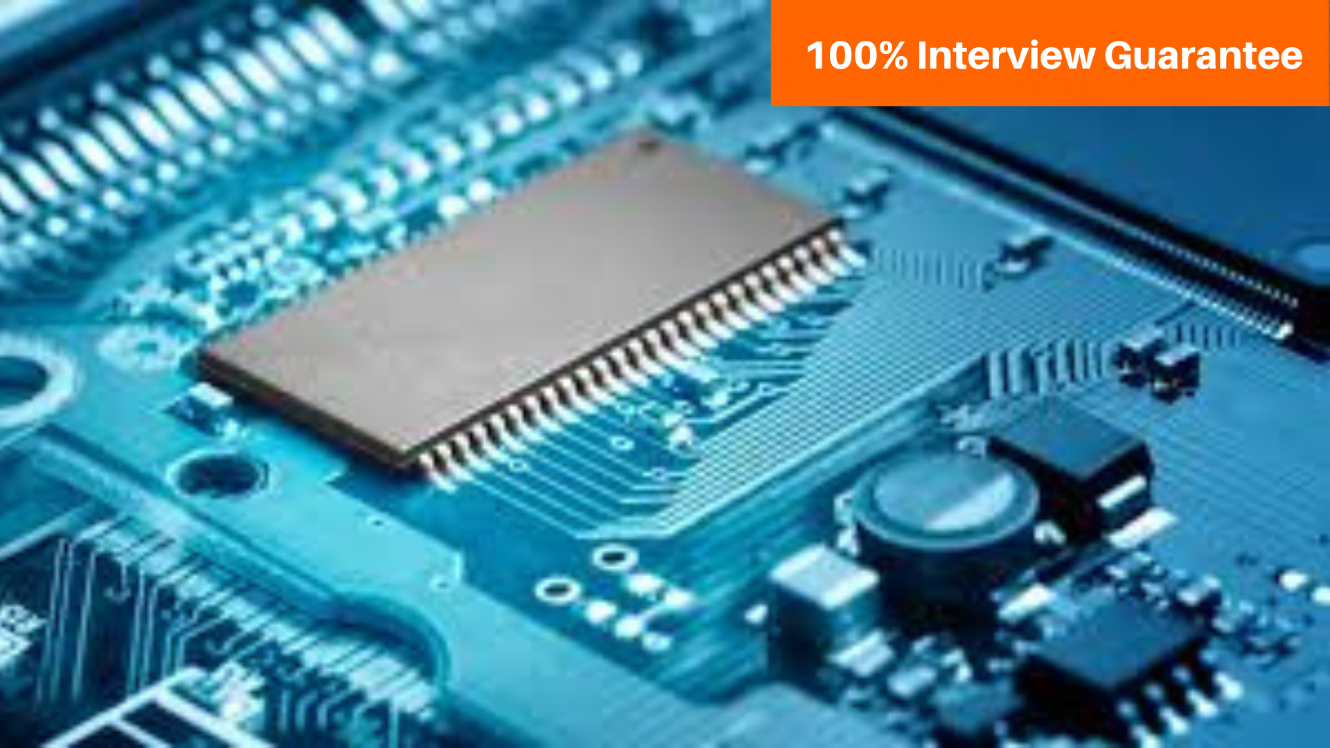 Best Electrical Designing course training institute in Hyderabad 1 - Caddesk Hyderabad - Caddesk Hyderabad Close-up of a blue computer motherboard with an orange badge that reads '100% Interview Guarantee' in the top-right corner.