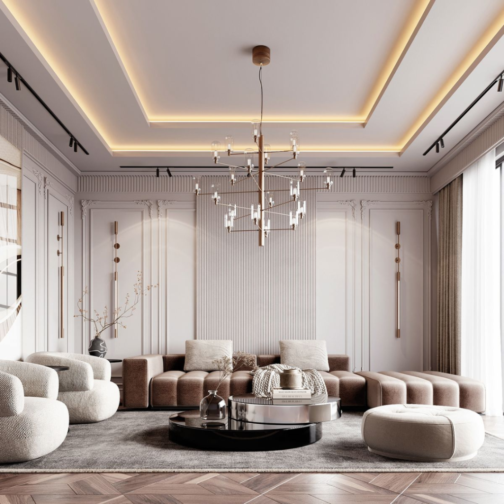 Luxurious beige living room with tufted sectional, round ottomans, and a modern chandelier.