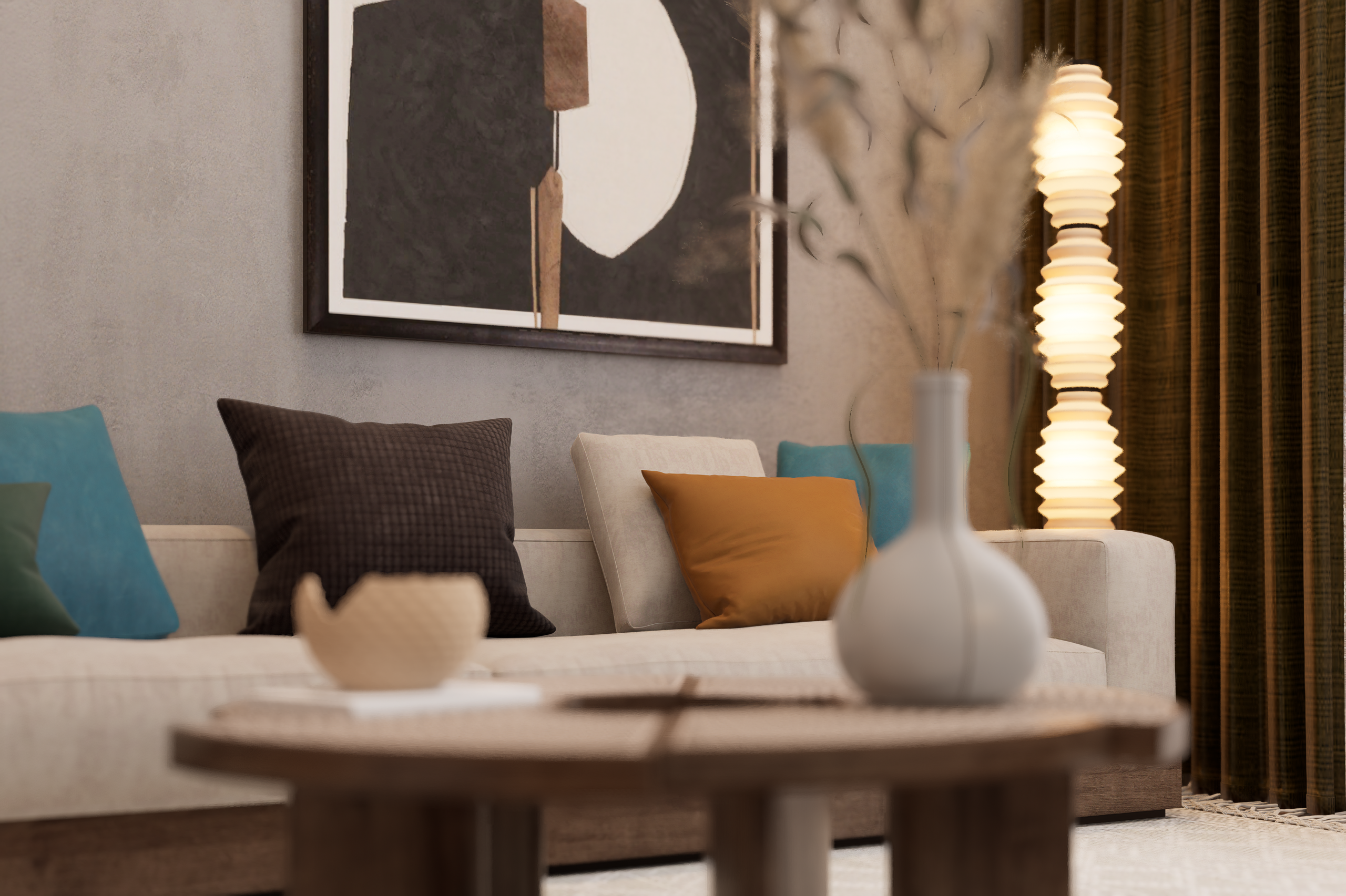 Cozy living room with a beige sofa, colorful throw pillows, and an abstract framed artwork above. A tall striped lamp glows softly nearby.